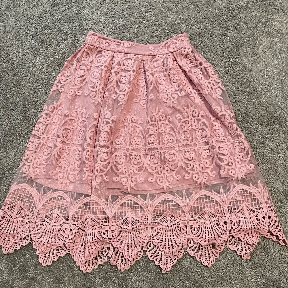 Pink lacey midi skirt.